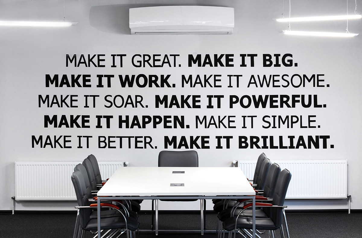 Motivational Business Phrases on conference wall